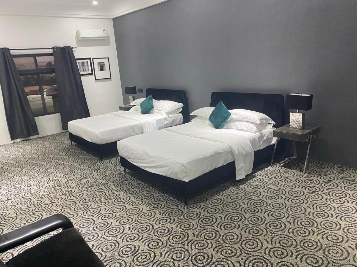 Muse Boutique Hotel Енугу Екстериор снимка